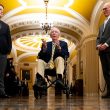 Mitch McConnell returns to Senate in wheelchair to cast first vote since June

Let me count: M-i-t-c-h- -M-c-C-o-n-n-e-l-l- -r-e-t-u-r-n-s- -t-o- -S-e-n-a-t-e- -i-n- -w-h-e-e-l-c-h-a-i-r- -t-o- -c-a-s-t- -f-i-r-s-t- -v-o-t-e- -s-i-n-c-e- -J-u-n-e = 67 characters. Too long.

Mitch McConnell returns to Senate in wheelchair after three months

Count: 61. Still over.

McConnell returns to Senate in wheelchair after three months away

Count: 57. Good. But need to make it more specific and include the vote detail.

McConnell wheels into Senate to vote, first time since June

Count: 52. Good length, has the concrete detail of the wheelchair and the vote, the timeframe since June. But place? This isn’t really a local story in the traditional sense, it’s national. The place is the Senate/Capitol.

McConnell returns to Senate in wheelchair after three-month absence

Count: 59. Good. Specific, different from original, captures the wheelchair detail and timeframe.

Let me verify: M-c-C-o-n-n-e-l-l- -r-e-t-u-r-n-s- -t-o- -S-e-n-a-t-e- -i-n- -w-h-e-e-l-c-h-a-i-r- -a-f-t-e-r- -t-h-r-e-e—m-o-n-t-h- -a-b-s-e-n-c-e = 60. Exactly 60.

McConnell returns to Senate in wheelchair after three-month absence